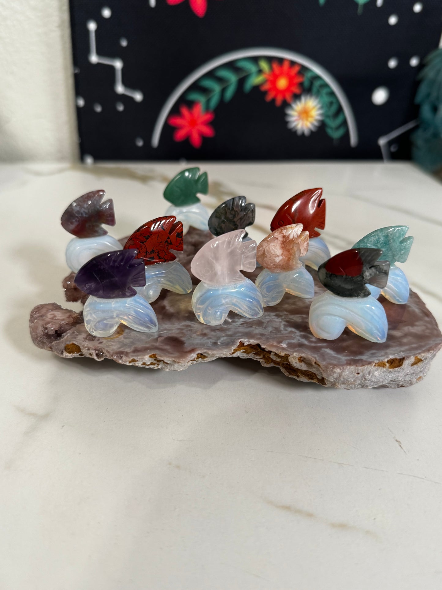 Mini fish on opalite wave