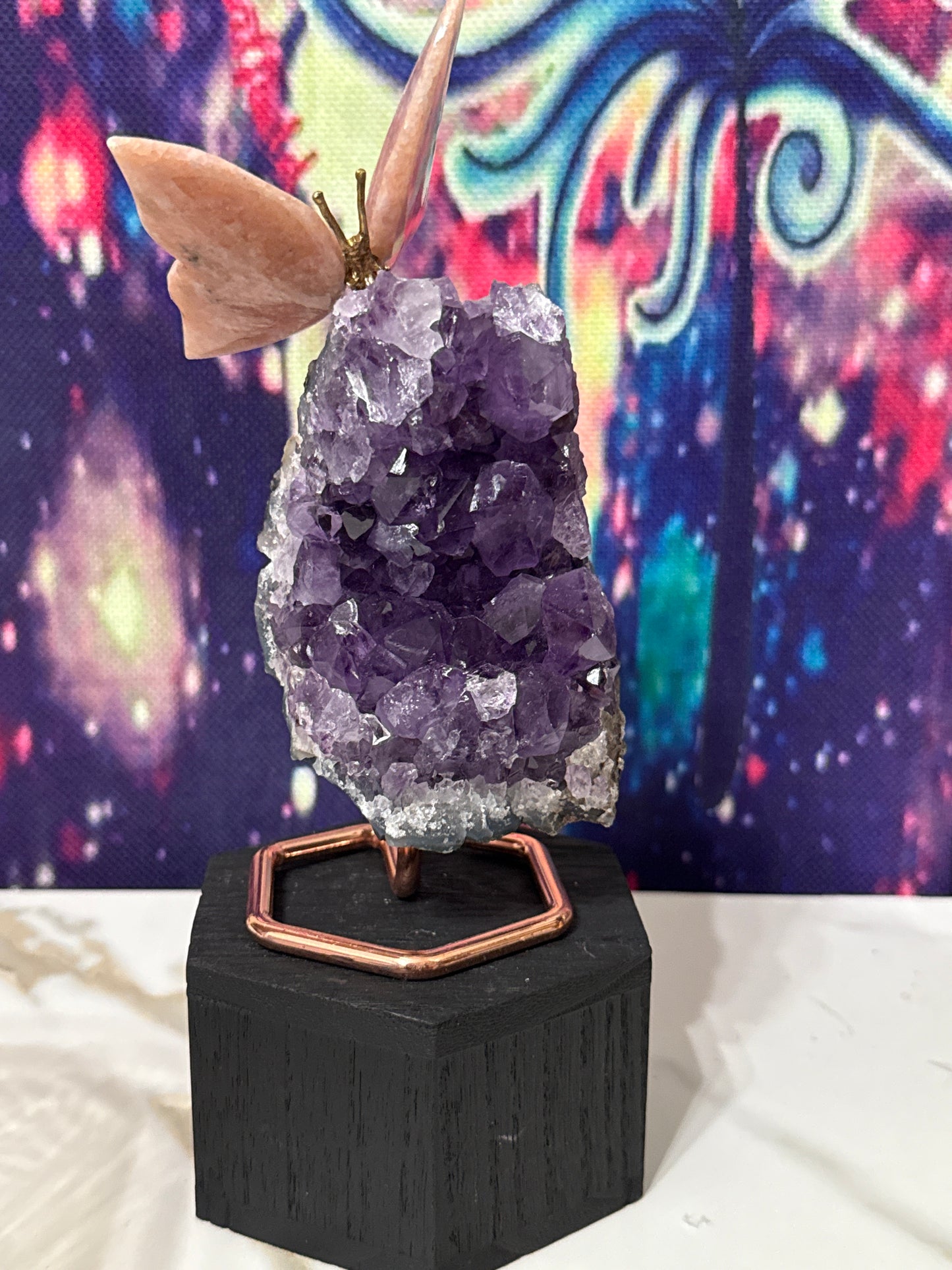 Amethyst cluster with butterfly