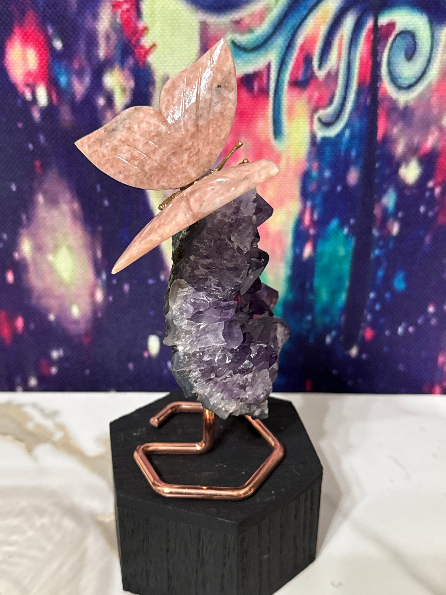 Amethyst cluster with butterfly